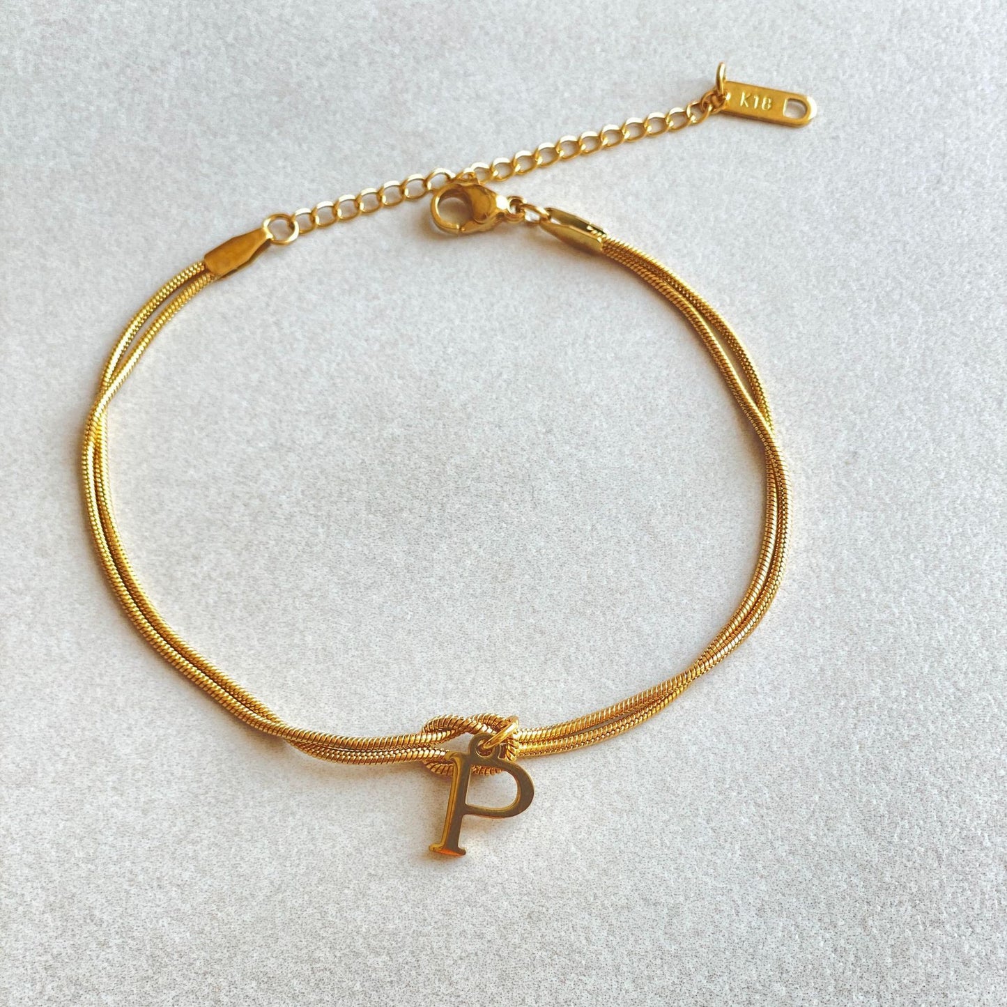 Golden initial bracelet