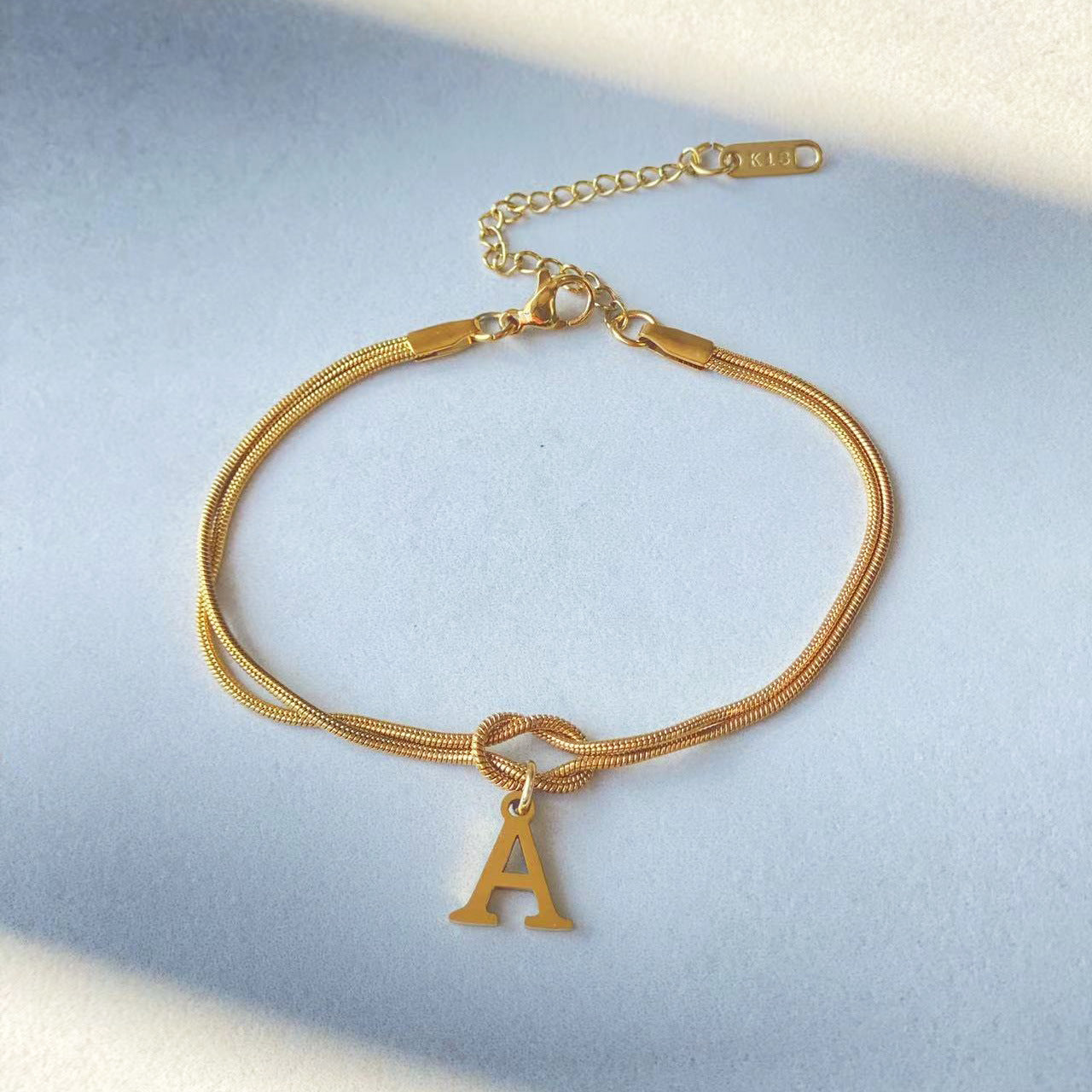 Golden initial bracelet