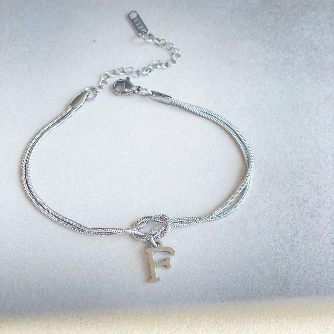 Golden initial bracelet