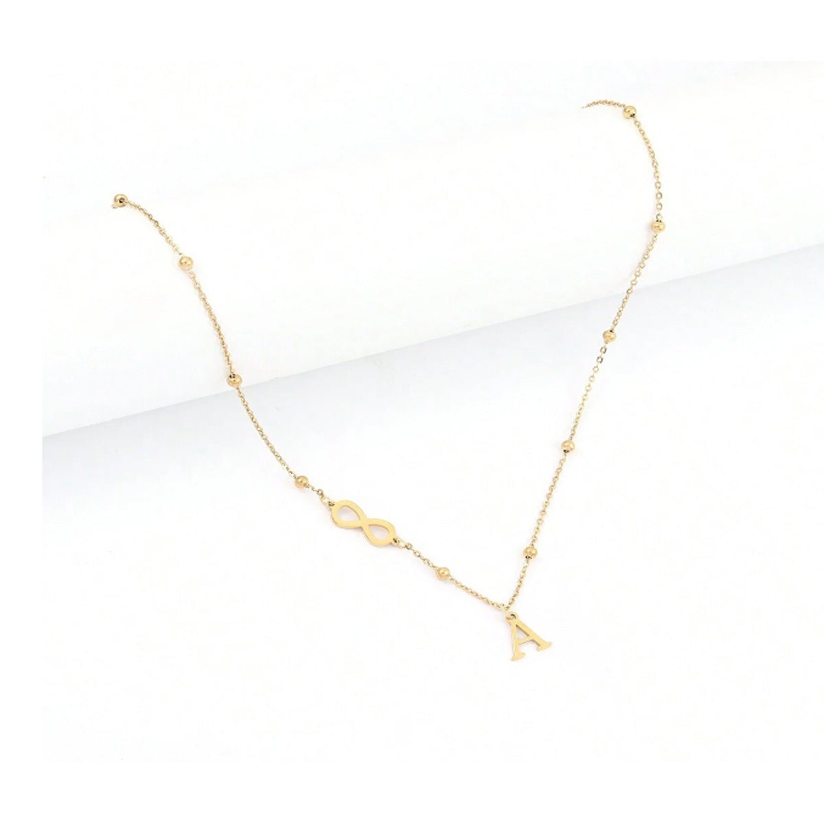 Golden initial necklace