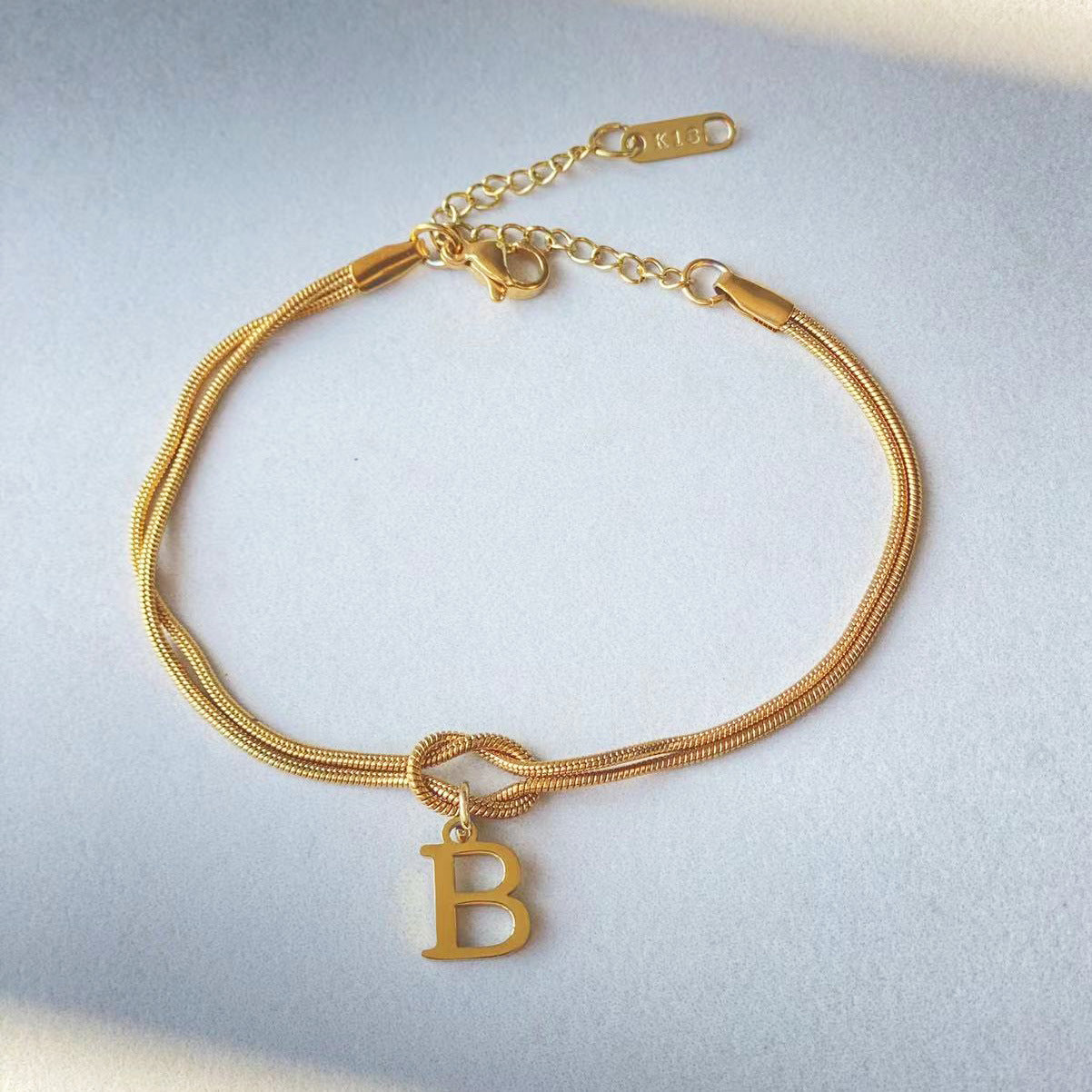 Golden initial bracelet