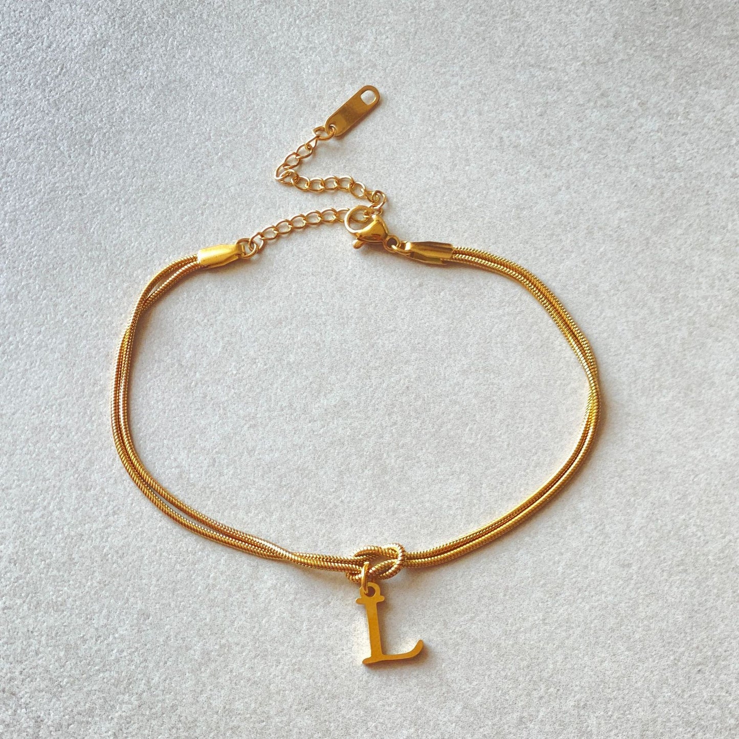 Golden initial bracelet