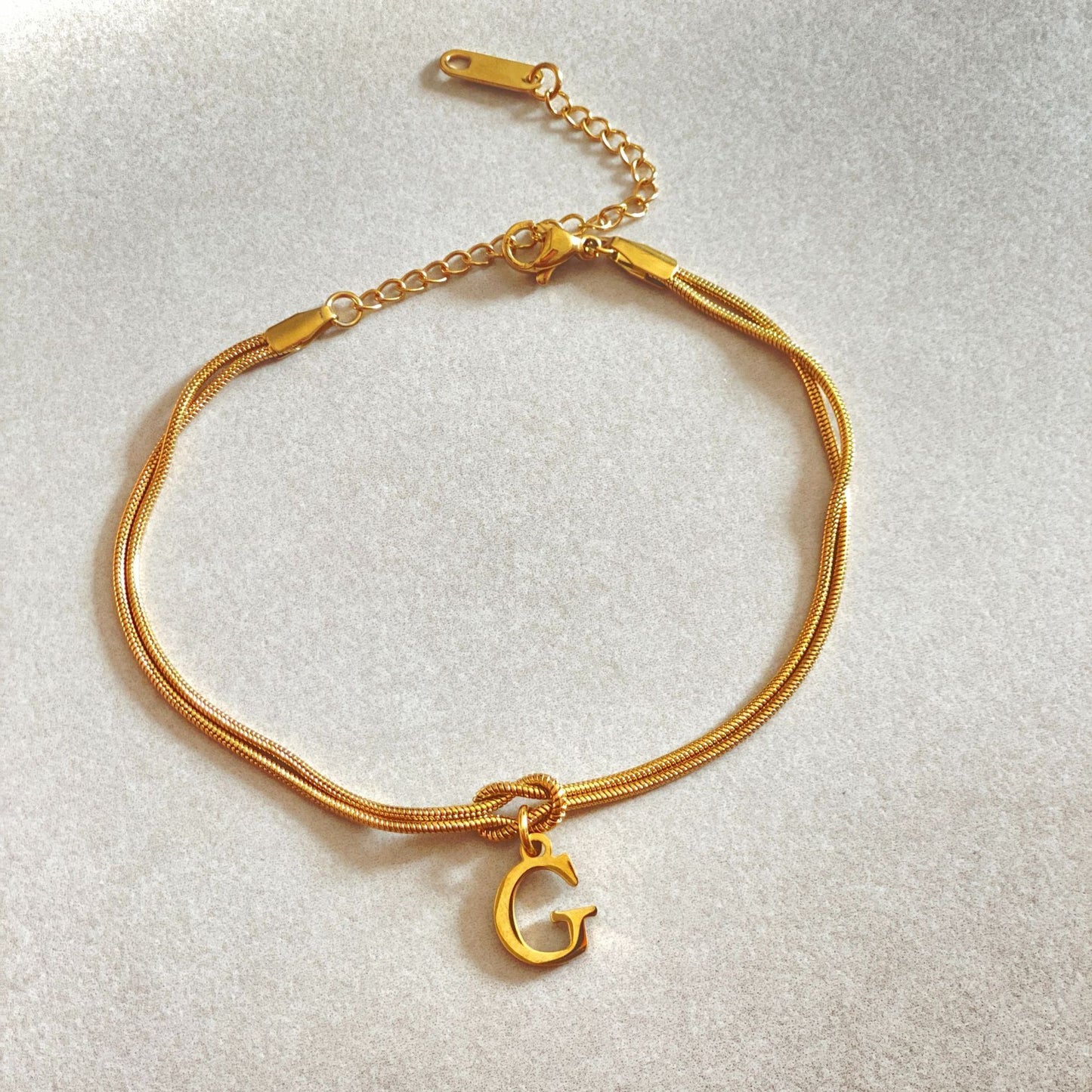 Golden initial bracelet