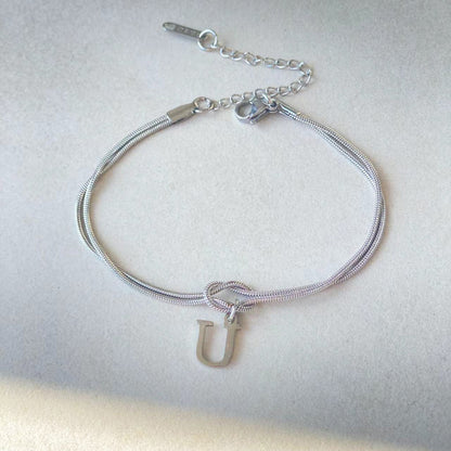 Golden initial bracelet