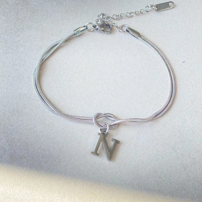 Golden initial bracelet