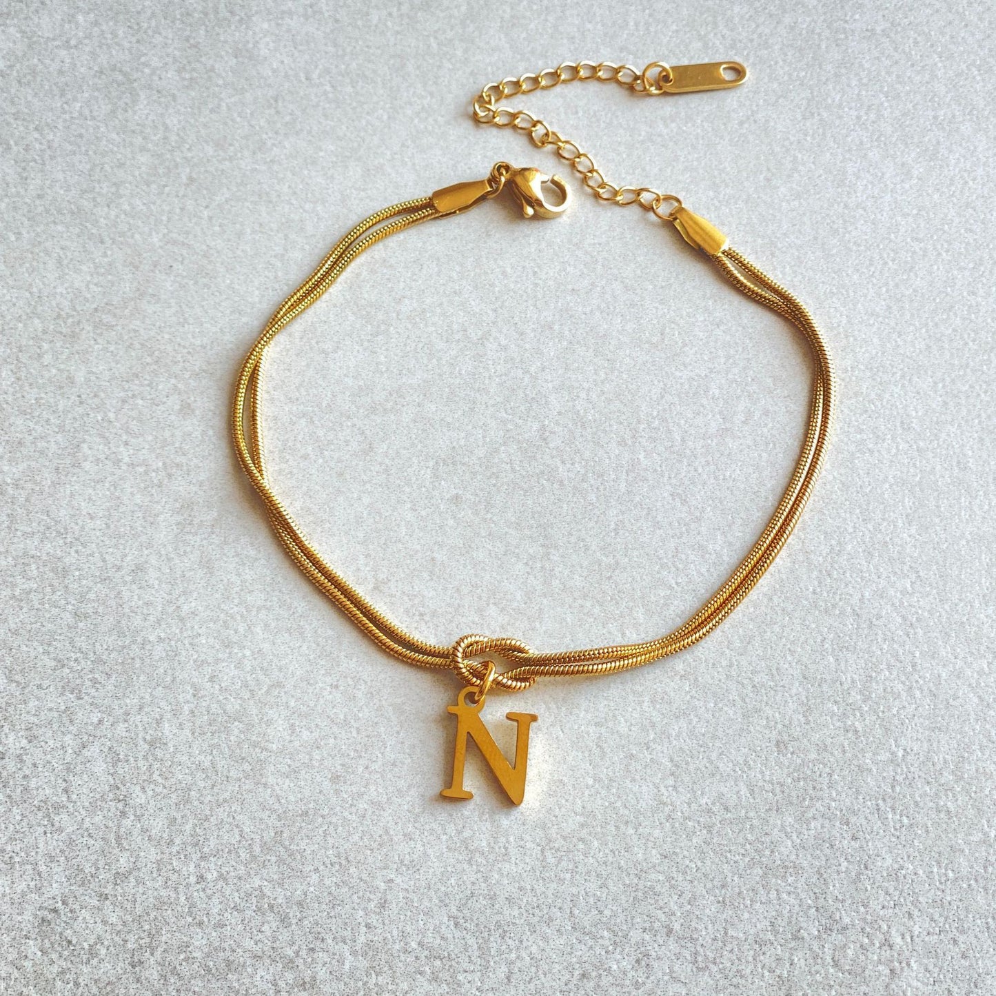 Golden initial bracelet