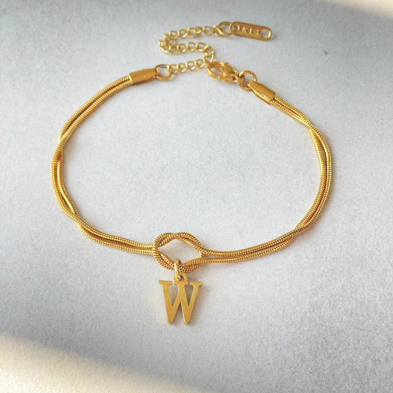 Golden initial bracelet