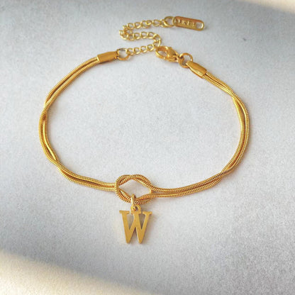 Golden initial bracelet