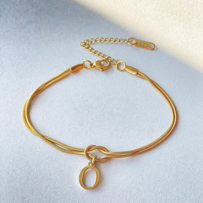 Golden initial bracelet