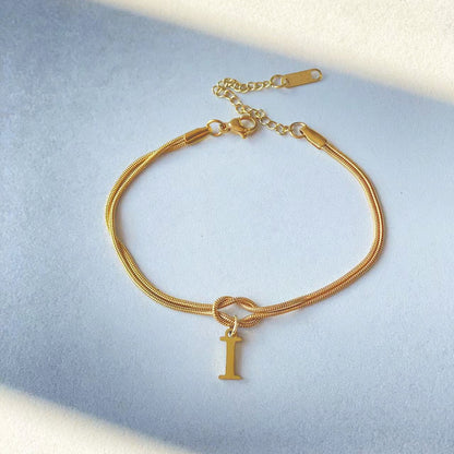 Golden initial bracelet