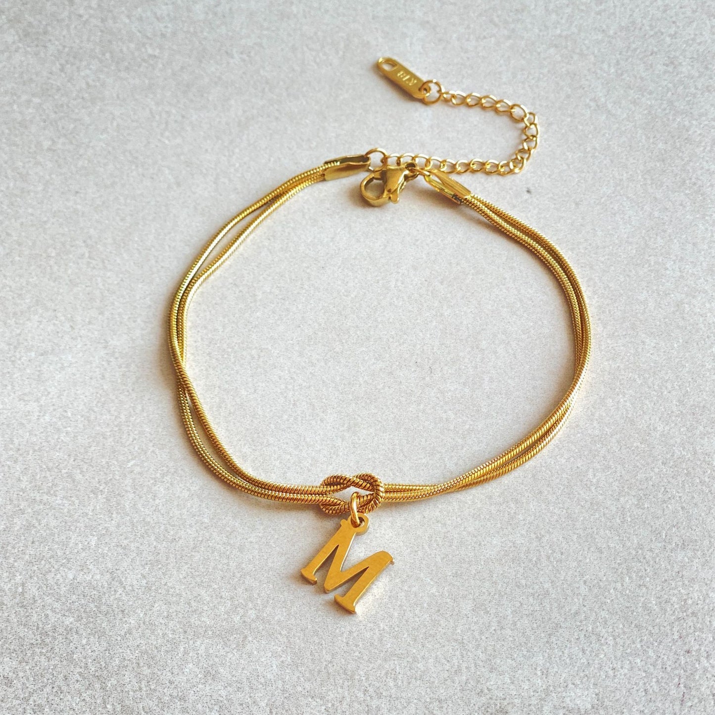 Golden initial bracelet