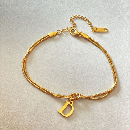 Golden initial bracelet