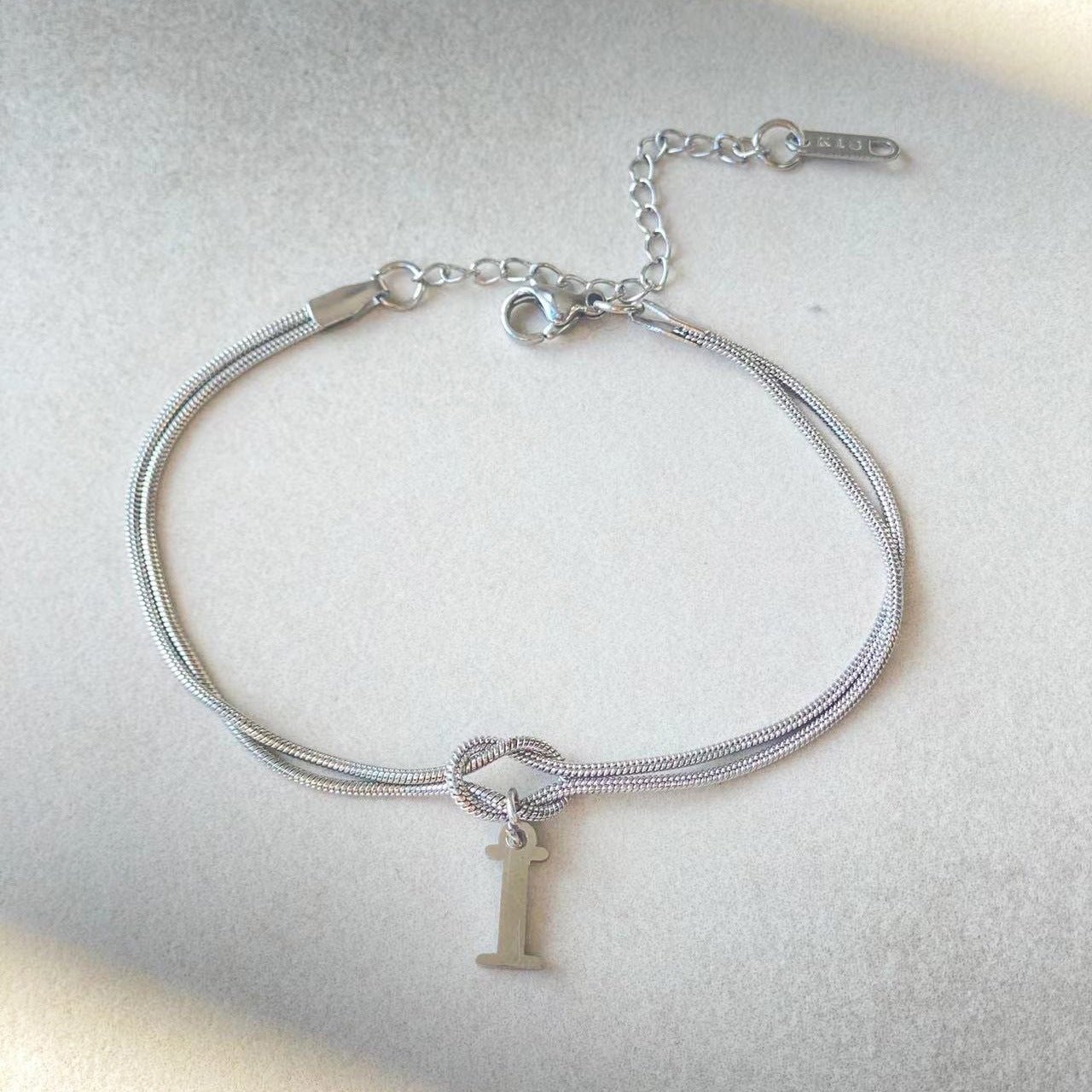 Golden initial bracelet