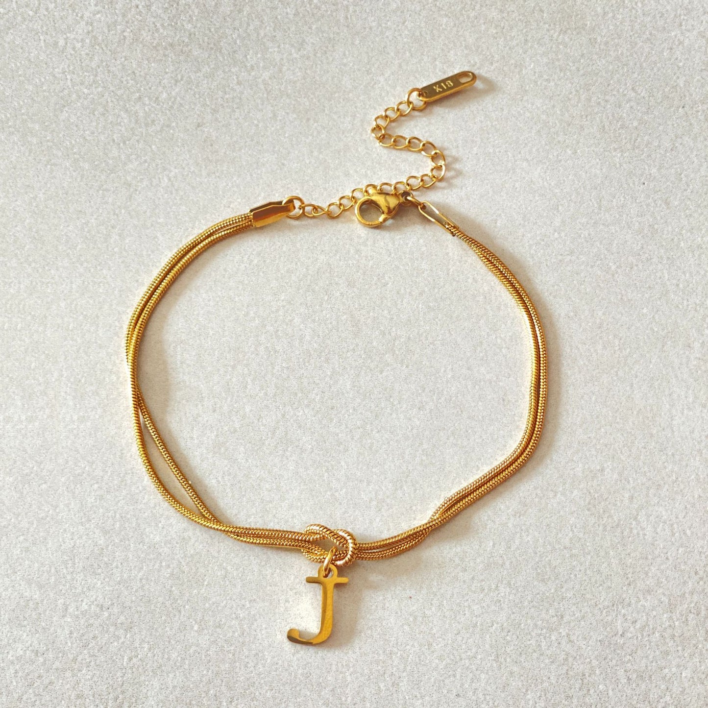 Golden initial bracelet