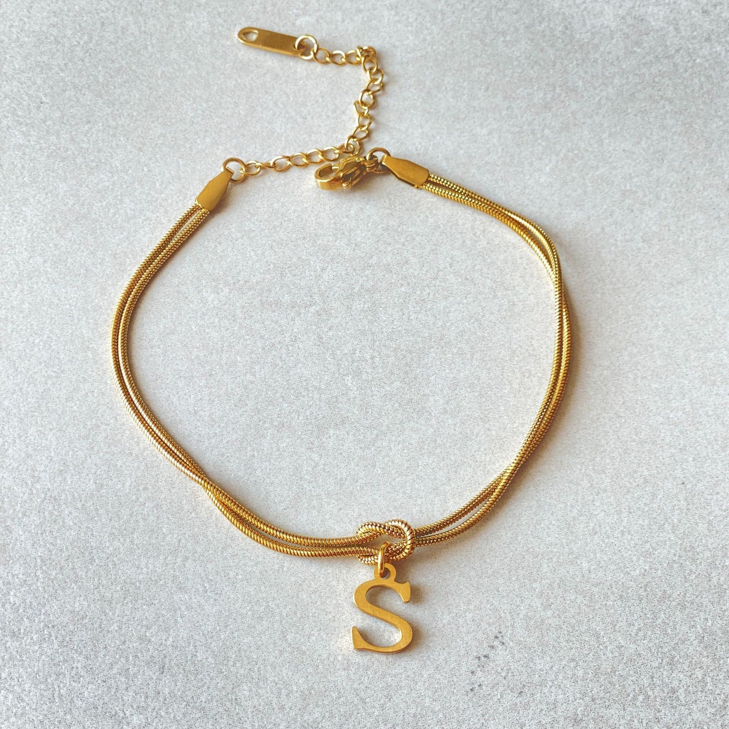 Golden initial bracelet