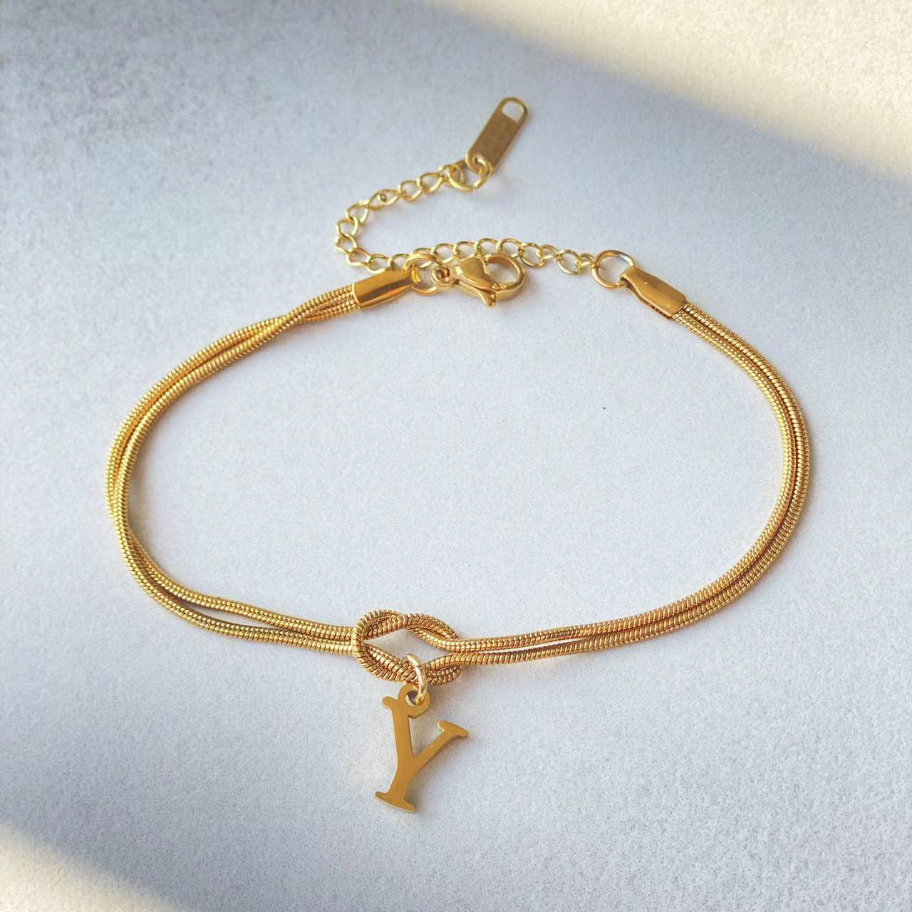 Golden initial bracelet