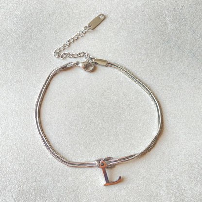 Golden initial bracelet
