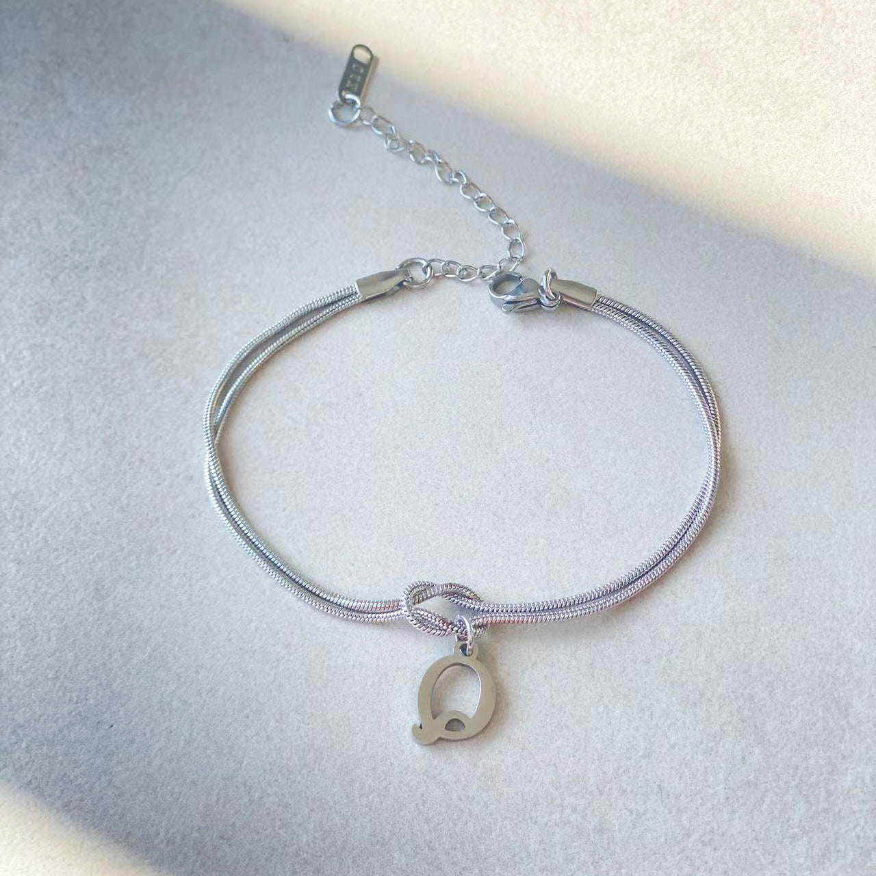 Golden initial bracelet