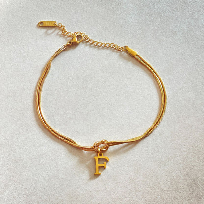 Golden initial bracelet