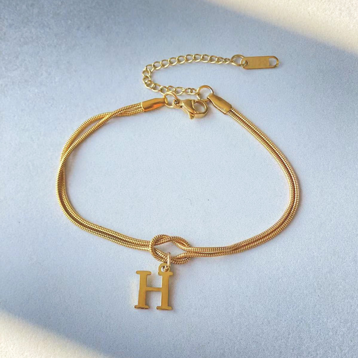 Golden initial bracelet