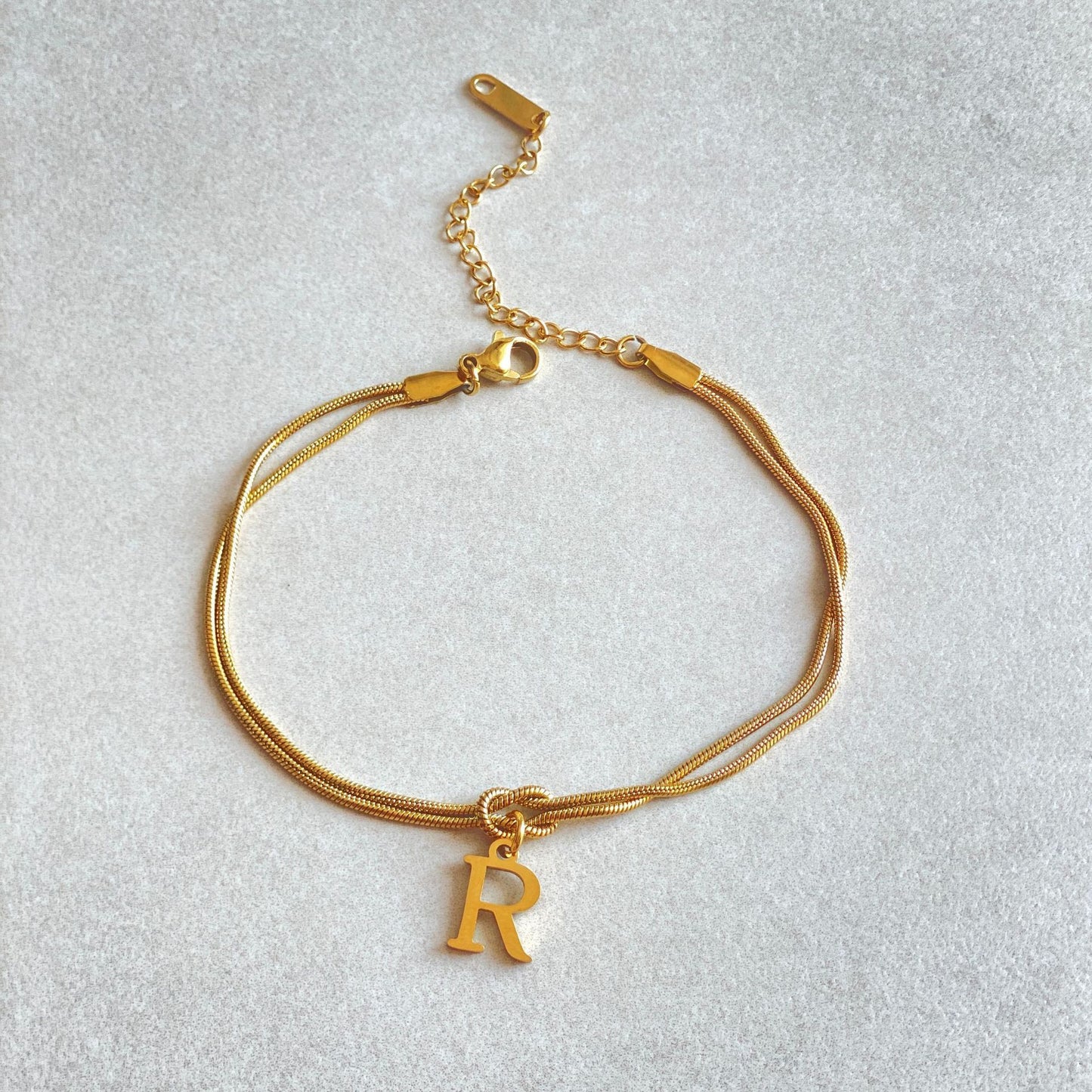 Golden initial bracelet