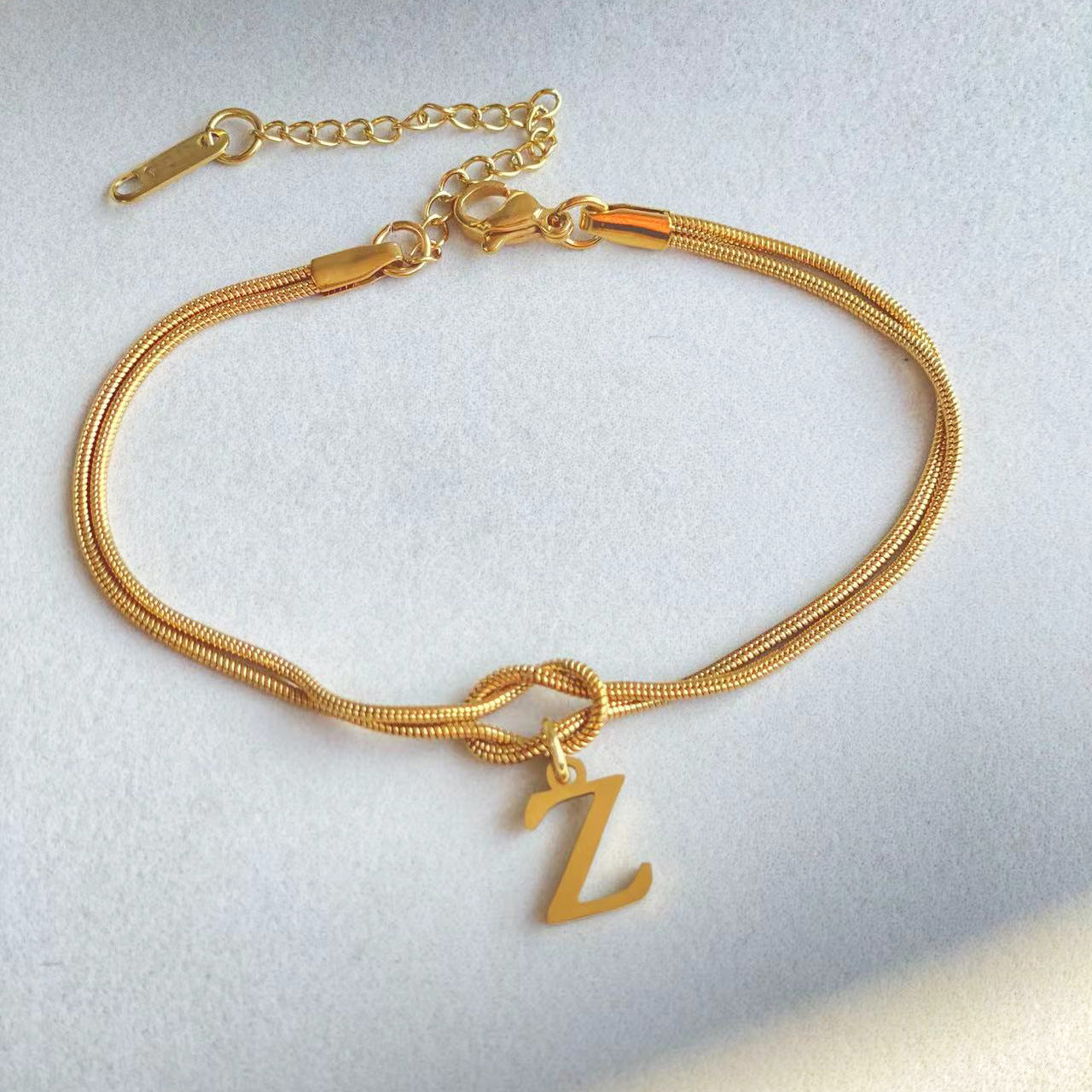 Golden initial bracelet