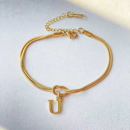 Golden initial bracelet