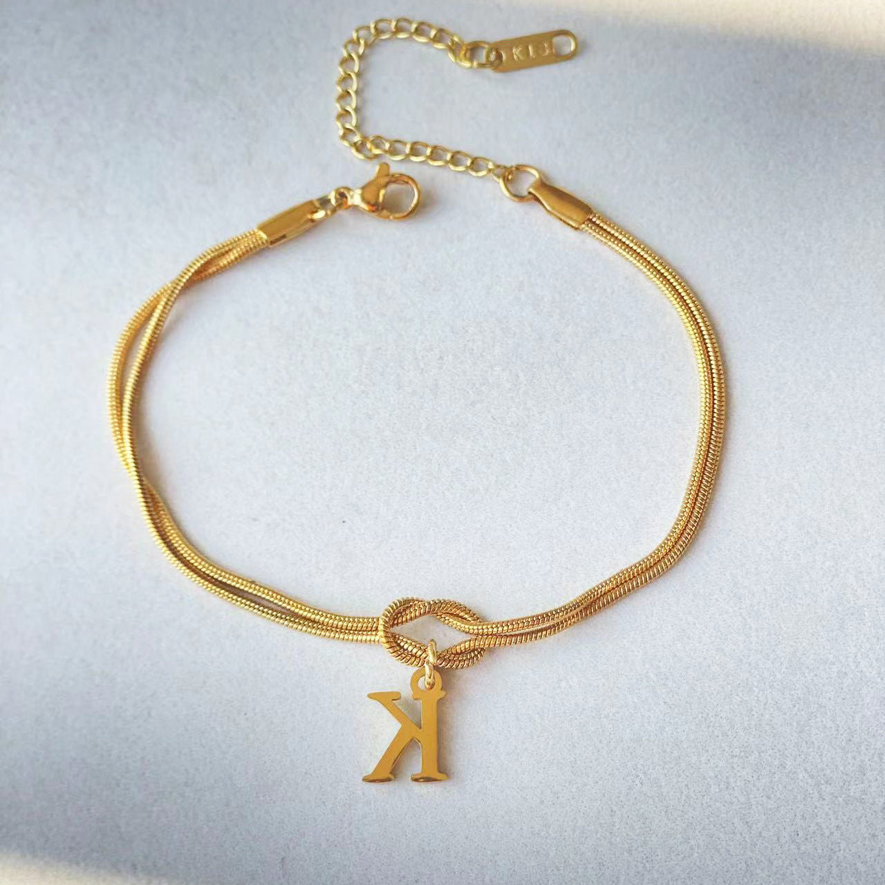 Golden initial bracelet