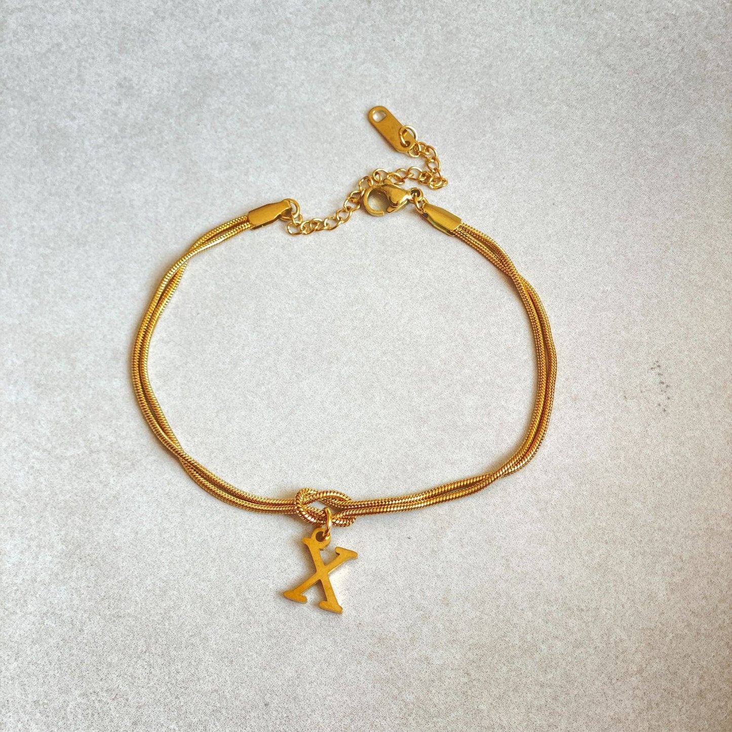 Golden initial bracelet
