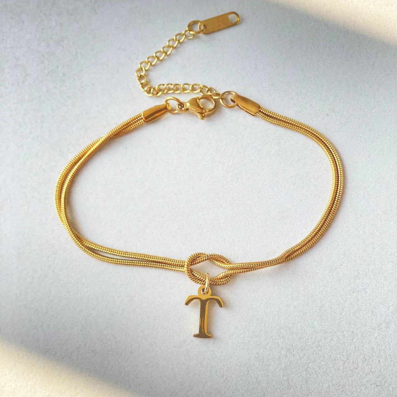 Golden initial bracelet