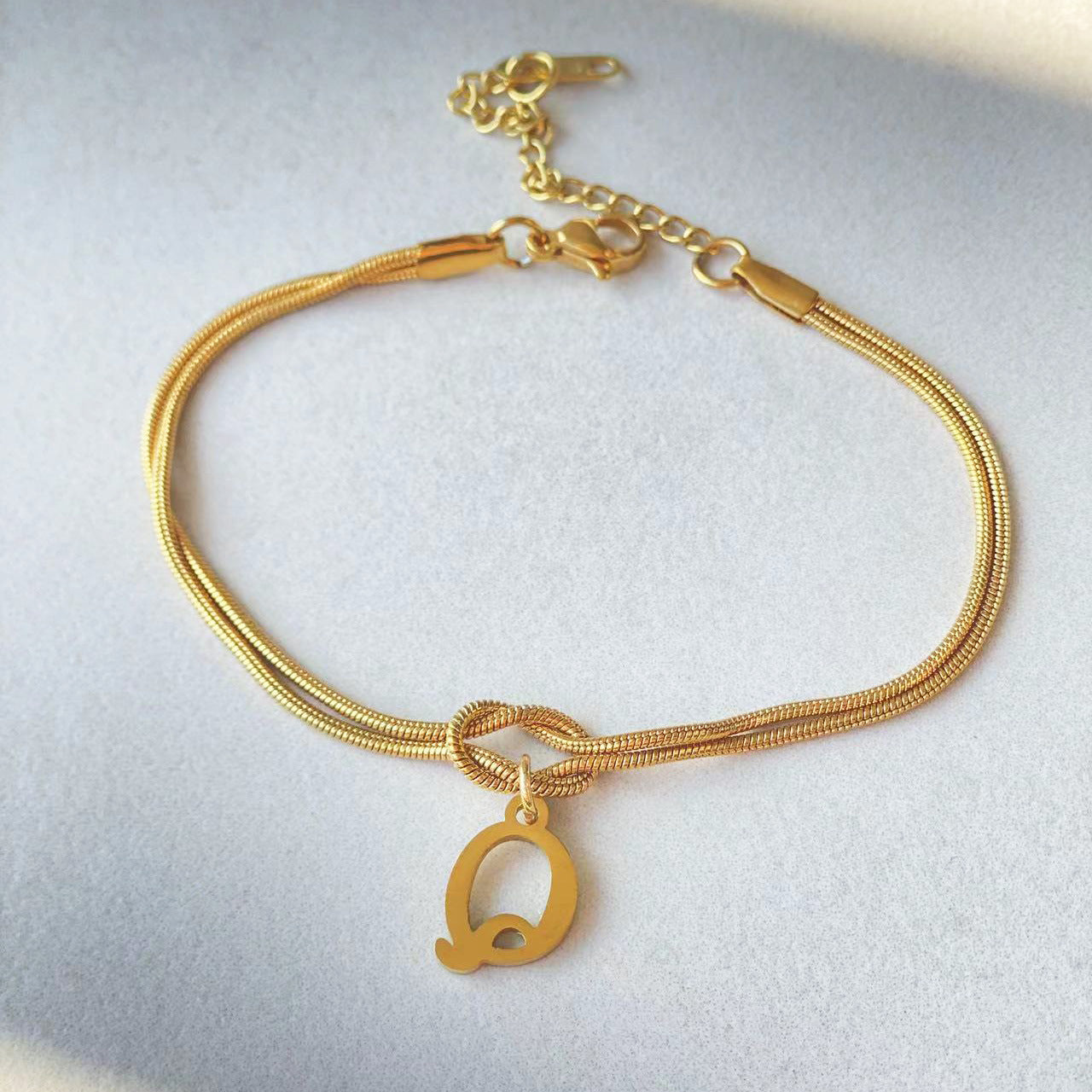 Golden initial bracelet