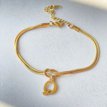 Golden initial bracelet